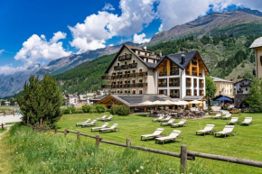 Отель Hotel Sant'Orso - Mountain Lodge & Spa  Конь